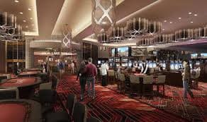 Filipino sports fan using bonus casino betting platform on smartphone